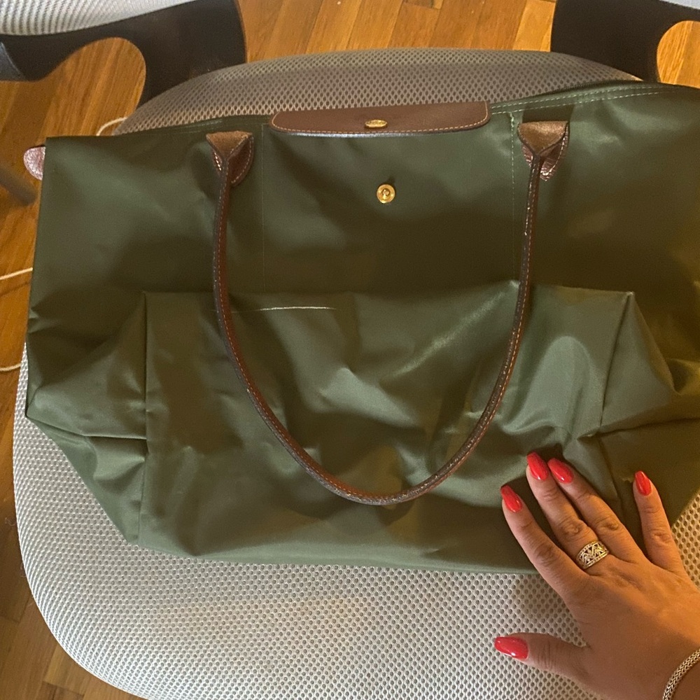 Longchamp original! Barely used. Inside could be cleaner however very gently.